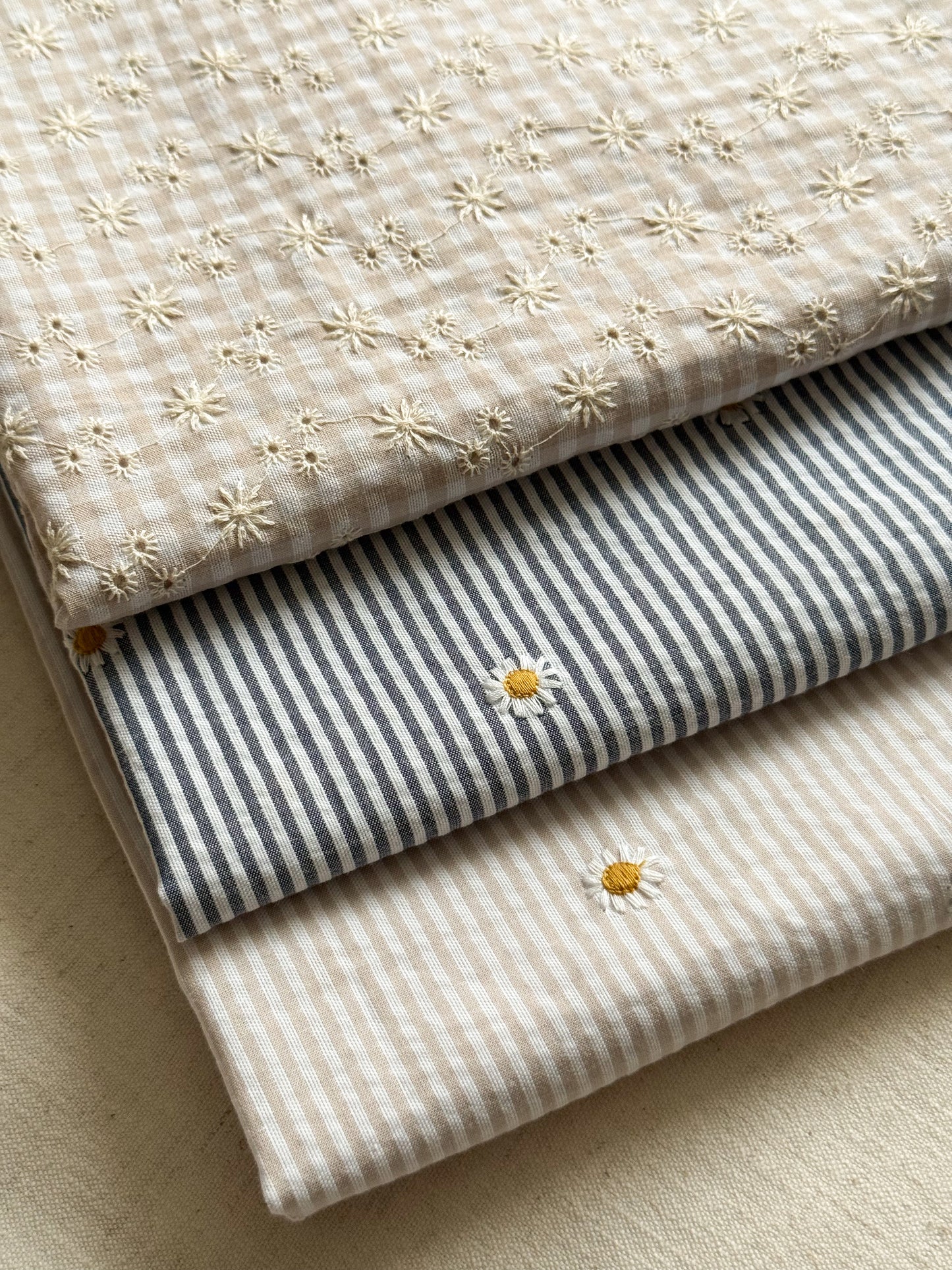 Cotton Stripe Seersucker Fabric With Embroidered Daisy - Navy