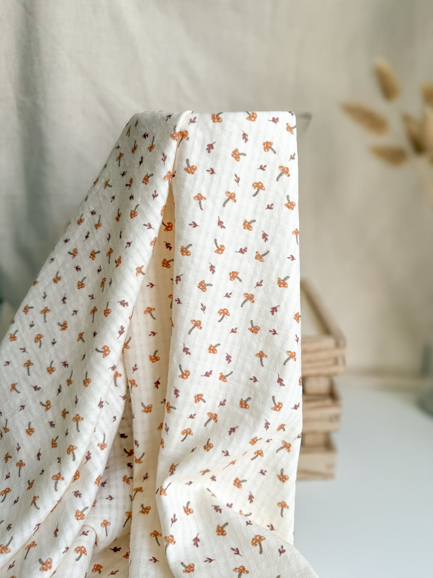 Cute Mushroom toadstool print on GOTS organic cotton seersucker fabric for sewing childrenswear and baby accessories.