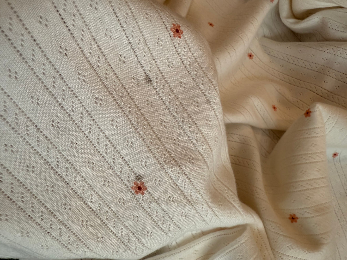 Printed Cotton Jersey Pointelle Fabric - Tiny Peach Flowers - 85cm Remnant