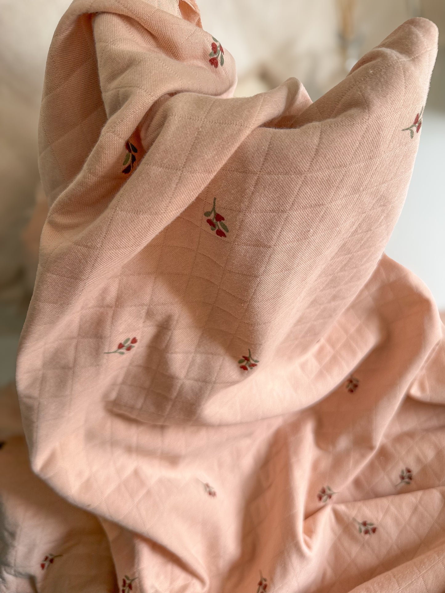 Pink quilted jersey with floral pattern