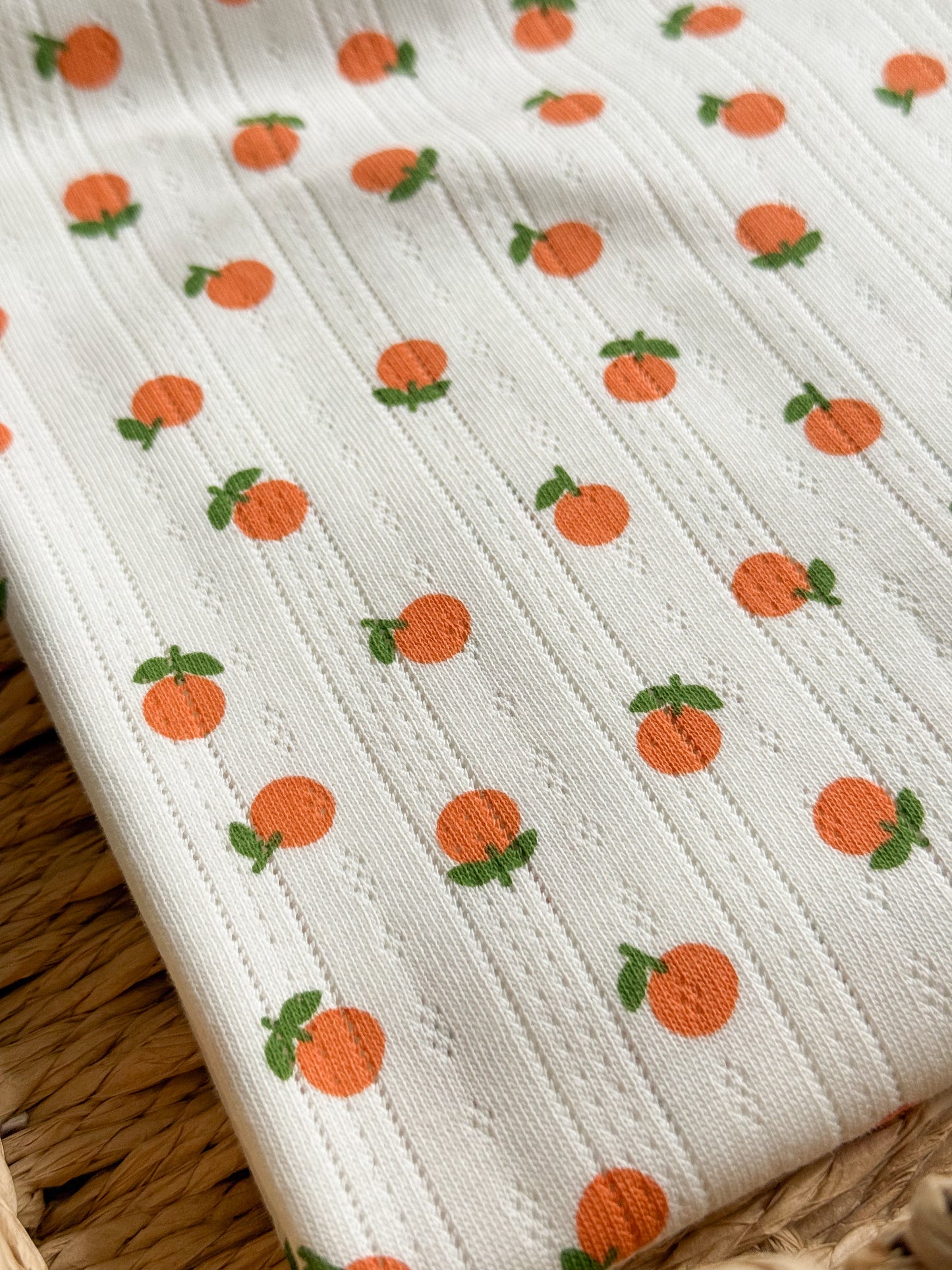 Printed Cotton Jersey Pointelle Fabric - Oranges