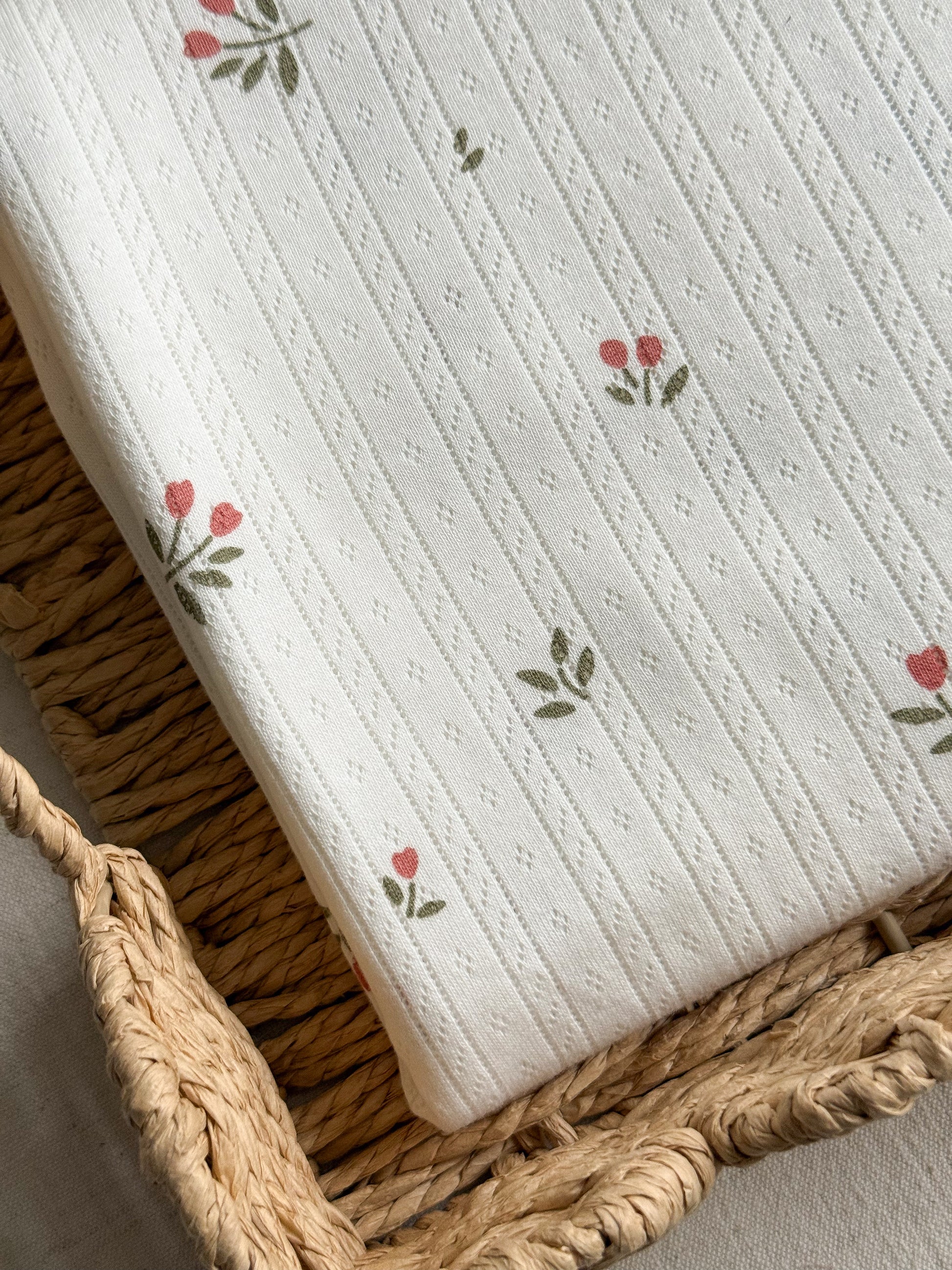 Off White Jersey Cotton Pointelle Fabric with Tulip Floral Pattern