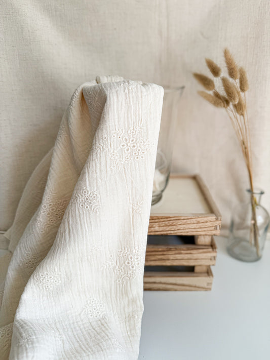 Textured embroidered cotton muslin dressmaking fabric 